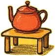 a teapot and a cup on a table.jpg
